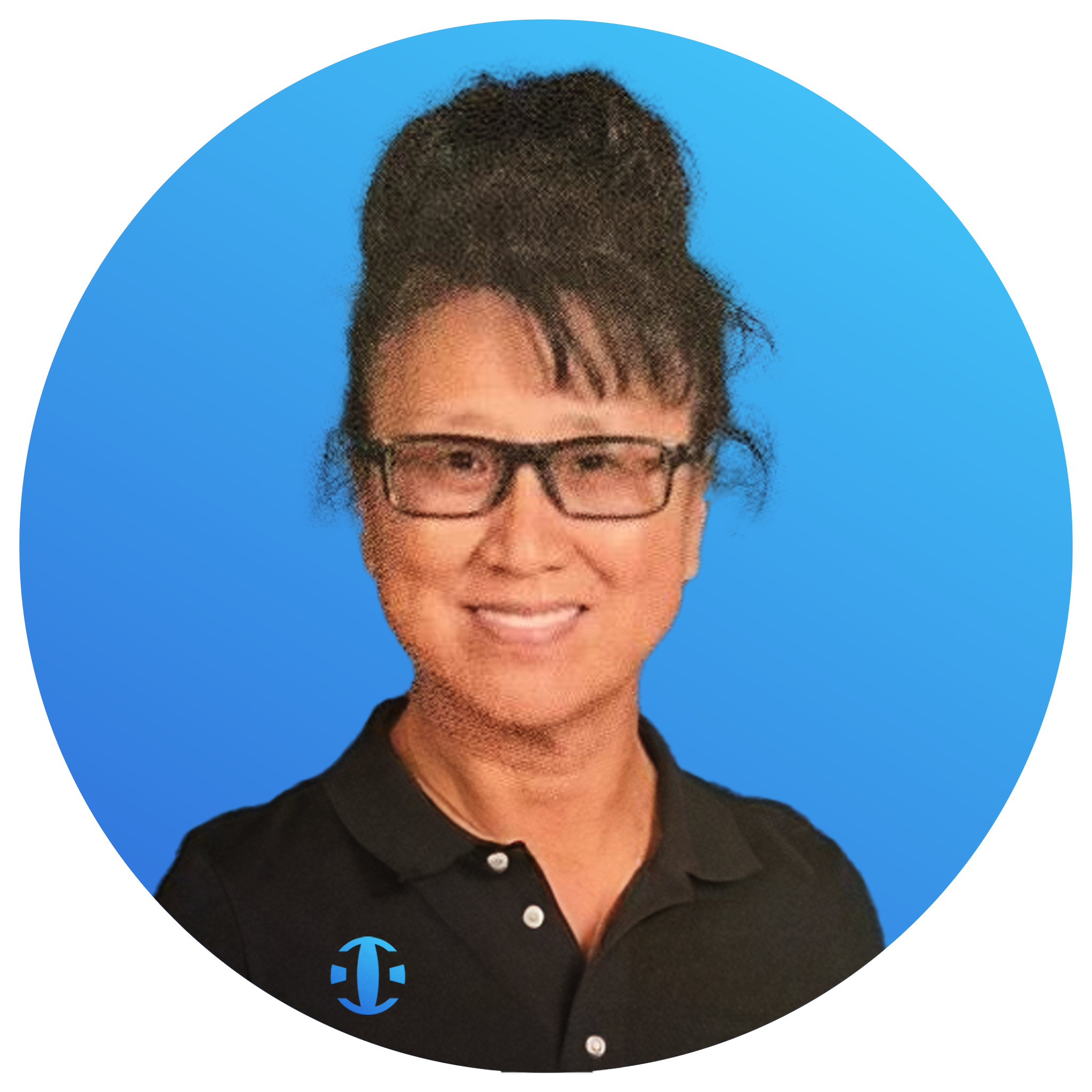 A smiling woman with short black hair styled in an updo, wearing black-rimmed glasses and a black collared shirt, against a blue background.