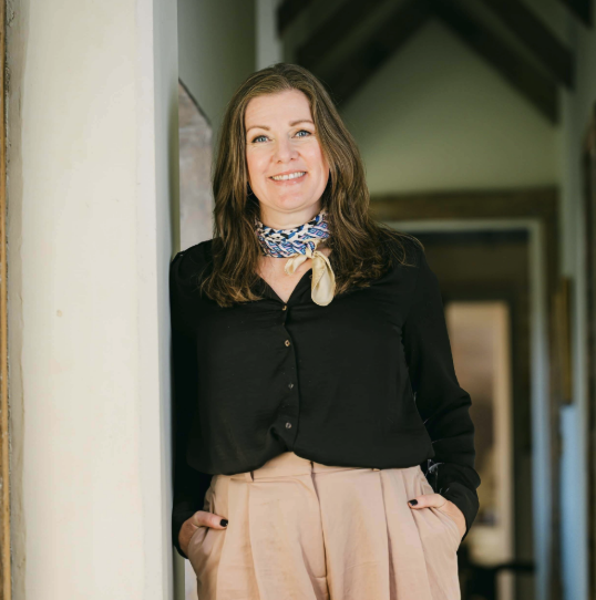 Christal Duncan, social entrepreneur and leadership coach at The Bench, in a warm professional headshot