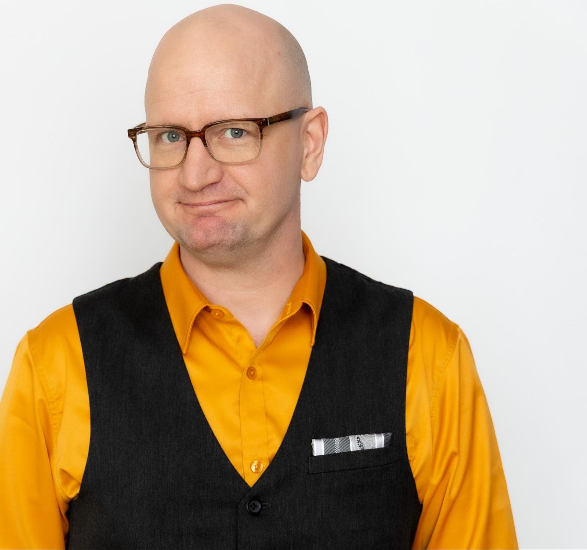 Terry, invitational leadership and neurodiverse team development coach at The Bench, in a professional portrait