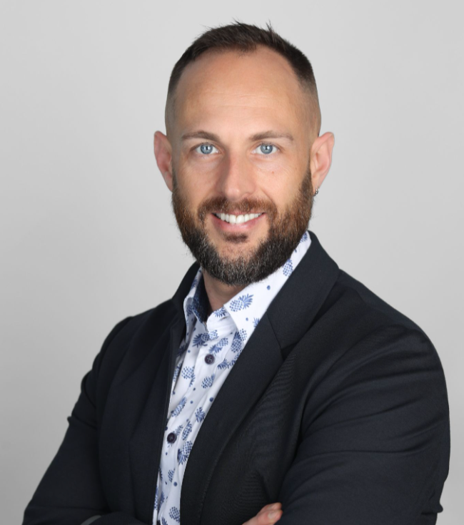Jeremy Long, certified executive leadership coach and organizational strategist at The Bench, in a professional branding portrait