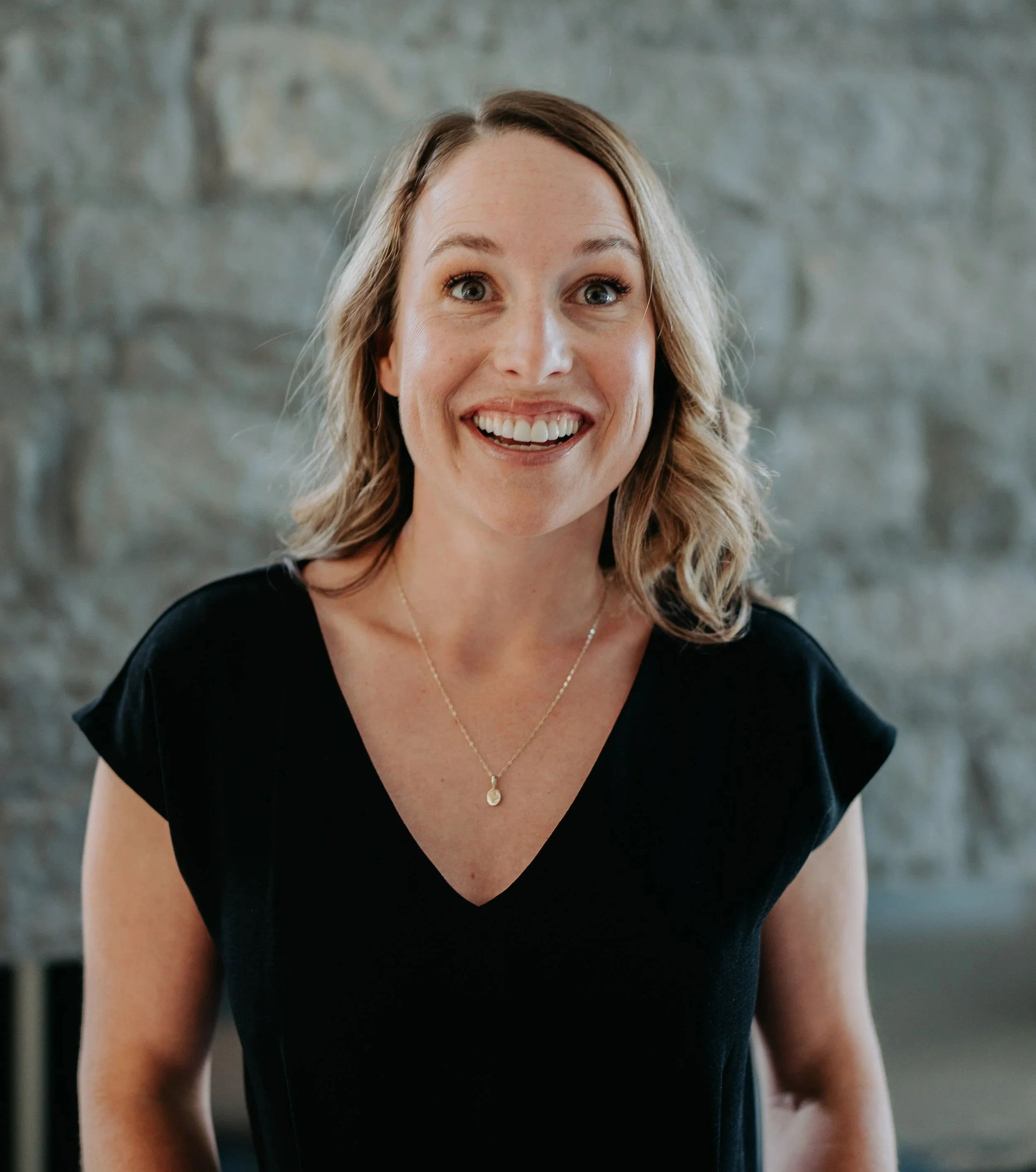 Courtney Marchment, leadership coach and co-founder of The Bench, in a professional portrait