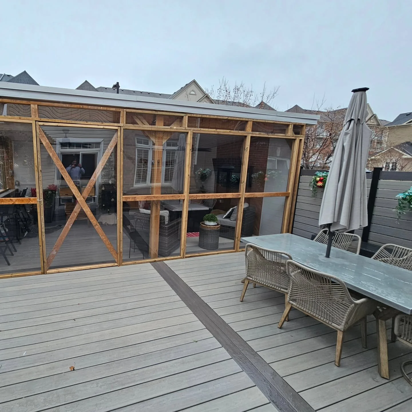 Removable outdoor enclosure with polycarbonate glass that has many capabilities and unbreakable but also insulation. This waa built to have up in the winter but come down for summer time.