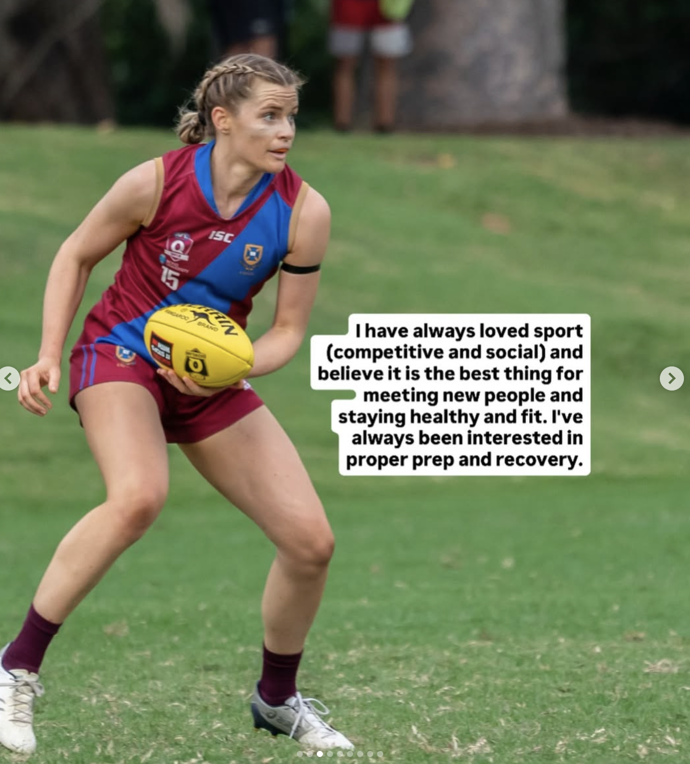 Female athlete holding a yellow football on a grassy field, wearing a maroon and blue sports uniform, with a braid hairstyle, and a speech bubble stating her love for sport and staying healthy.