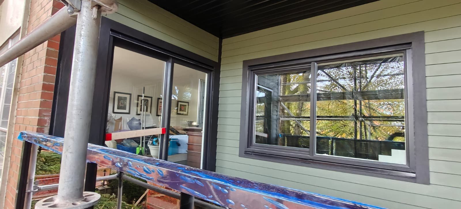 New cladding, windows and doors