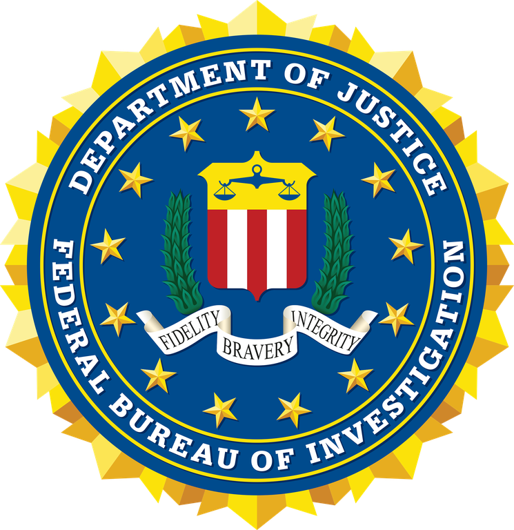 Official seal of the Federal Bureau of Investigation (FBI) featuring a gold border, a blue background, a shield with red and white stripes, scales of justice, green laurel branches, and a white ribbon with the words 'Fidelity, Bravery, Integrity'.