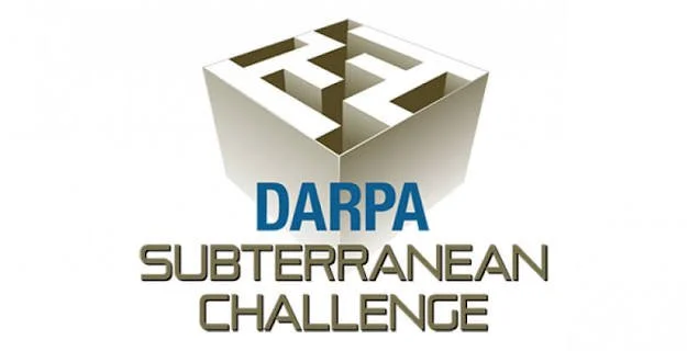 Logo for DARPA Subterranean Challenge featuring a maze inside a cube.
