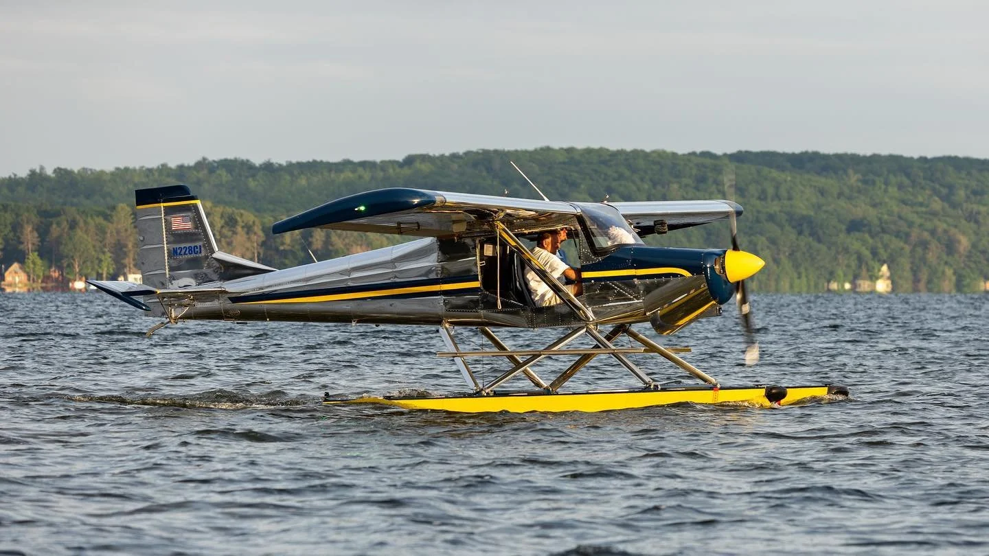 Murphy Rebel seaplane taxiing on a Michigan lake during water operations