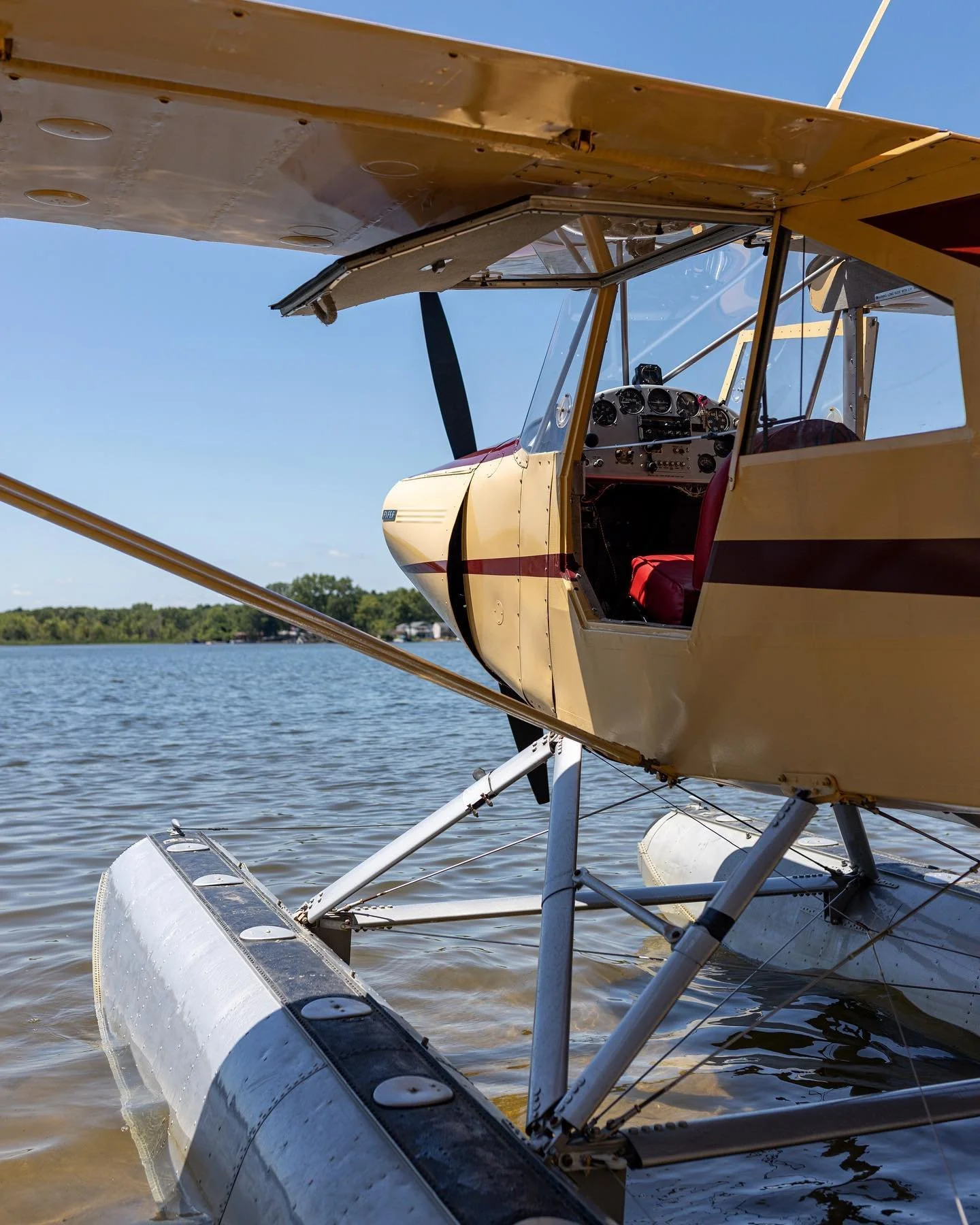 Floatplane cockpit and floats on the water at a Michigan seaplane base