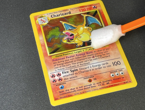 Trading card restoration service to repair creases, scratches, and dents for better grading results