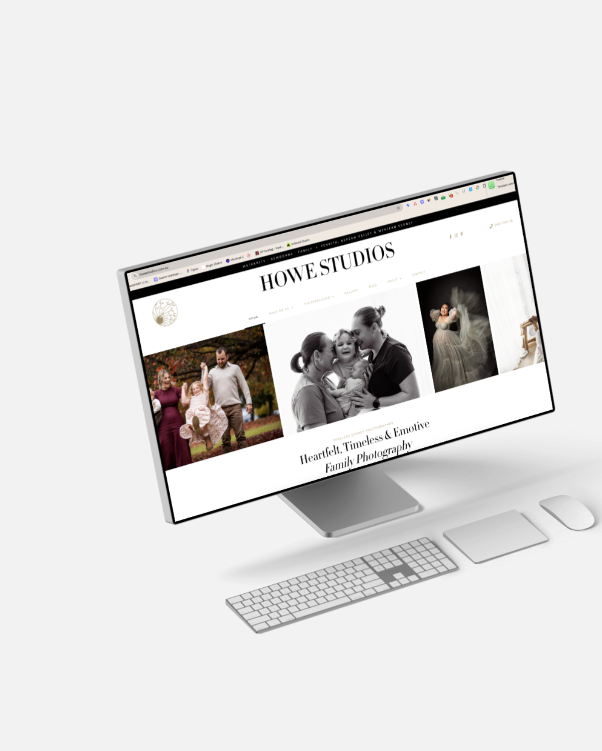 Computer monitor displaying a photography website called Howe Studios with images of families and children.