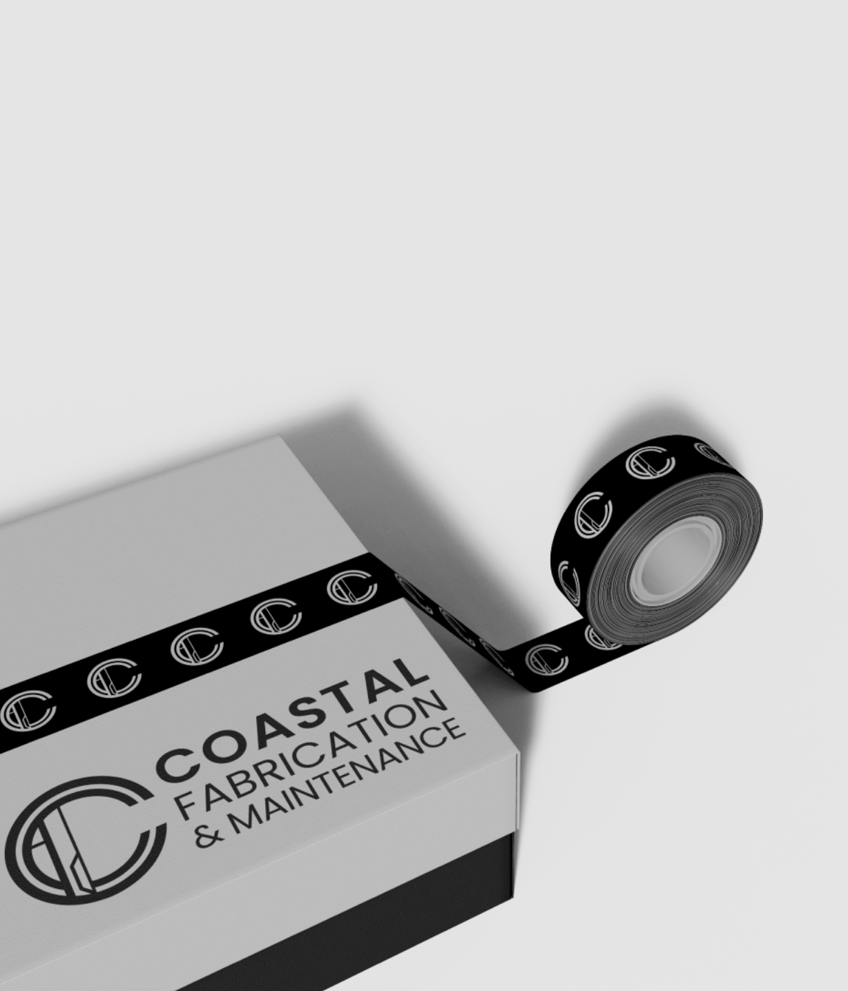 Roll of black and white branded tape labeled Coastal Fabrication & Maintenance, with the tape partially unrolled and extending onto a white surface.