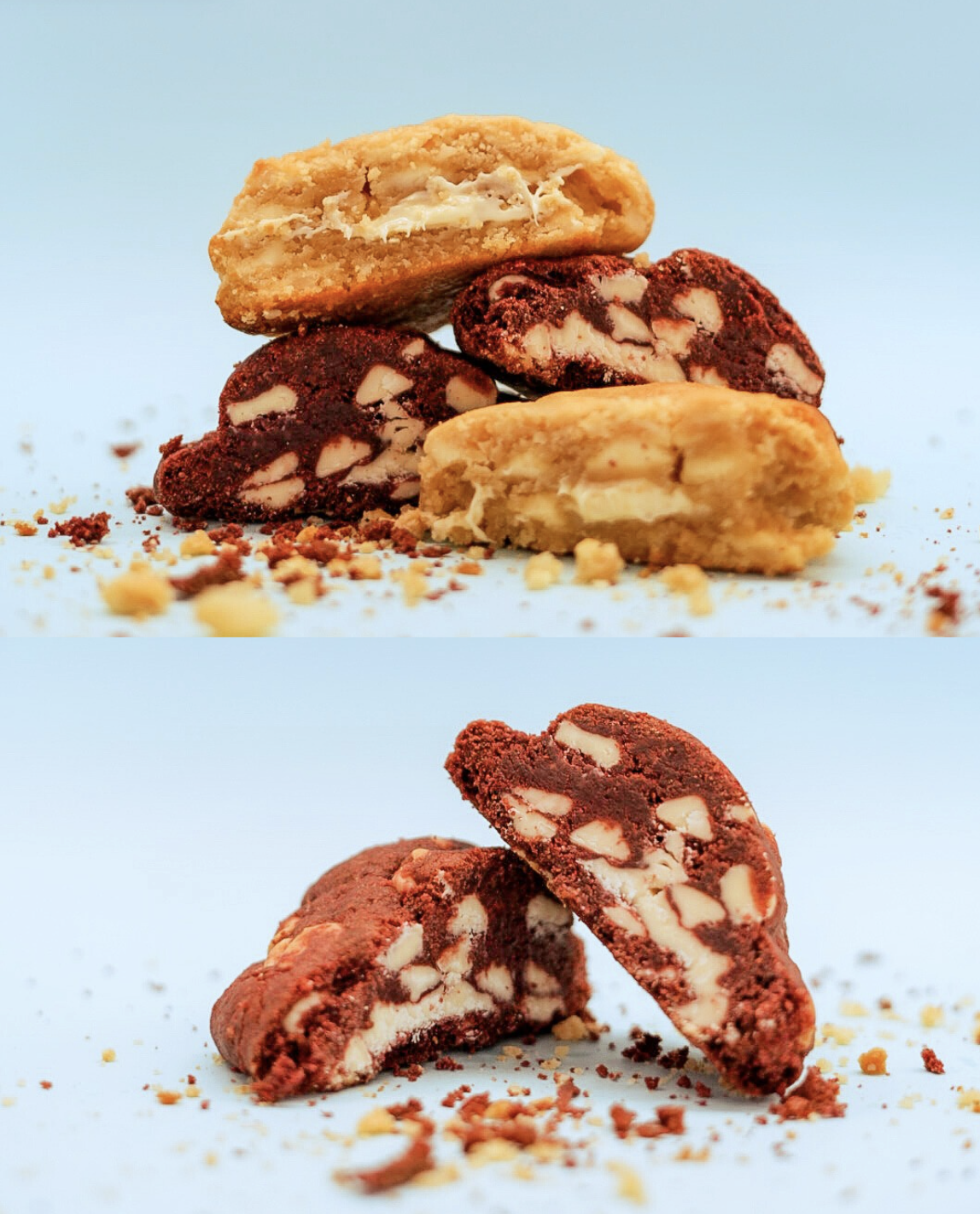 Close-up of assorted cookies, including chocolate and vanilla varieties, on a light blue surface.