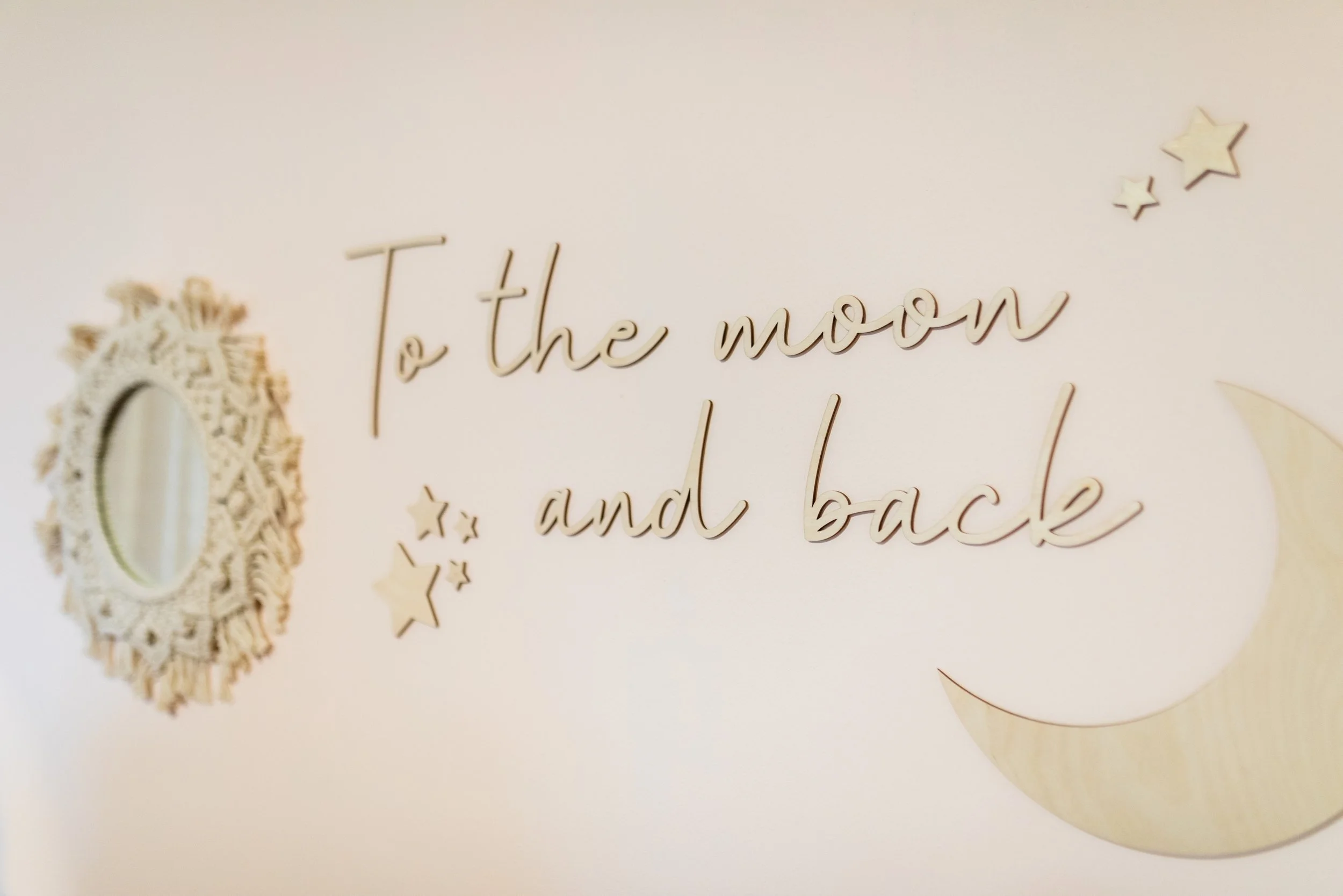 Soft illustration of a moon and stars, symbolizing enduring love and connection.