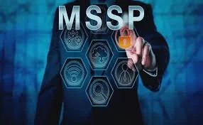 Person in business suit points at a virtual screen with icons and the abbreviation 'MSSP' in the background.