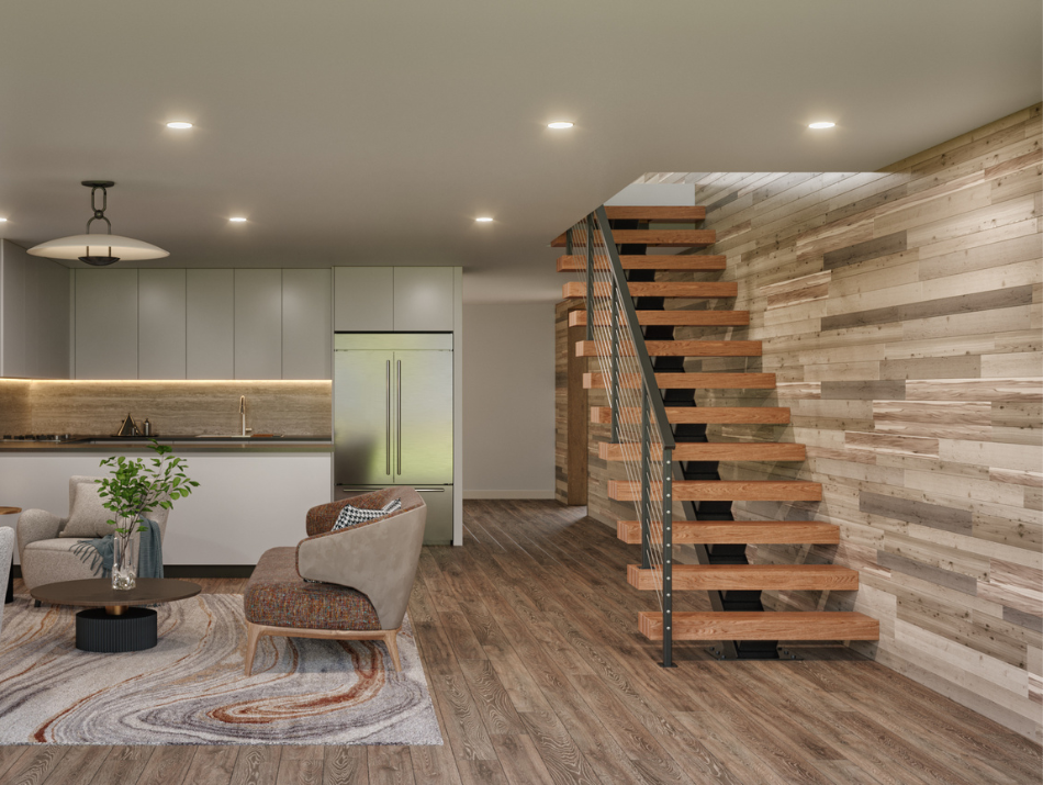 Modern living room with wooden staircase, wood paneled wall, gray kitchen cabinets, stainless steel refrigerator, and seating area with armchairs and a plant.