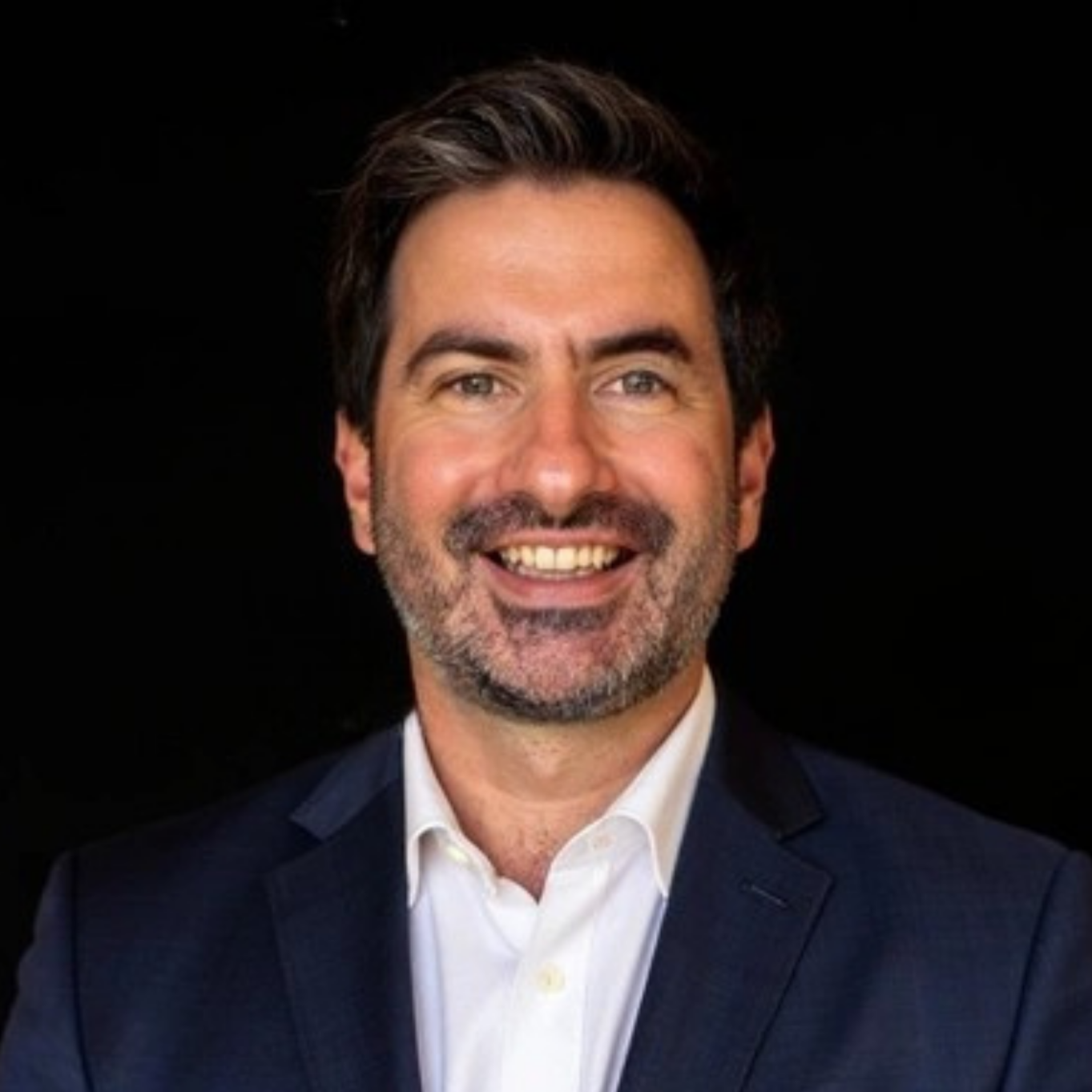 Headshot of Andrew Kolotelo, Principal Consultant at ako labs.