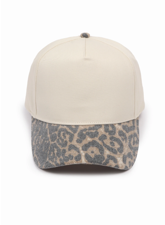 Cap with a beige upper and leopard print brim.
