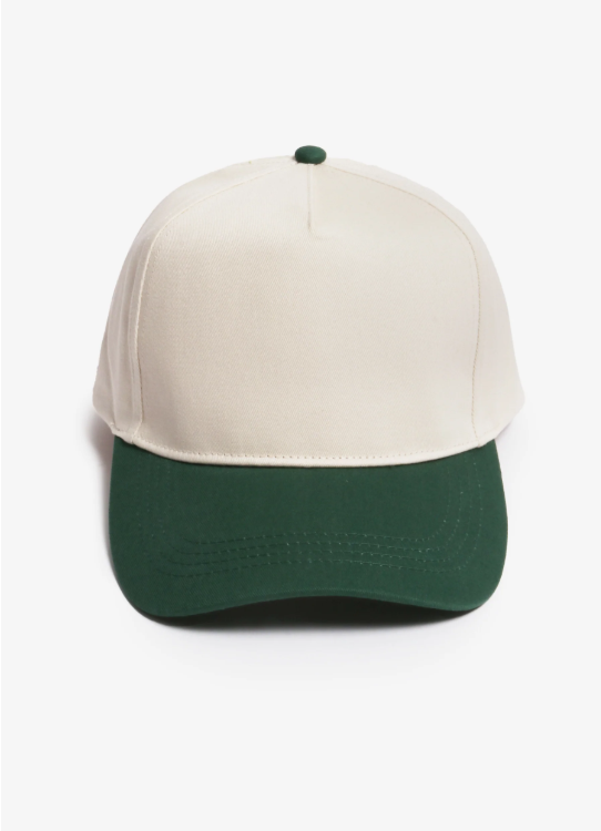 Two-tone baseball cap with a cream-colored crown and a dark green brim, set against a plain white background.