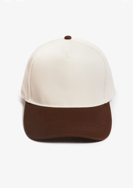 White and brown baseball cap with a white crown and brown brim on a white background