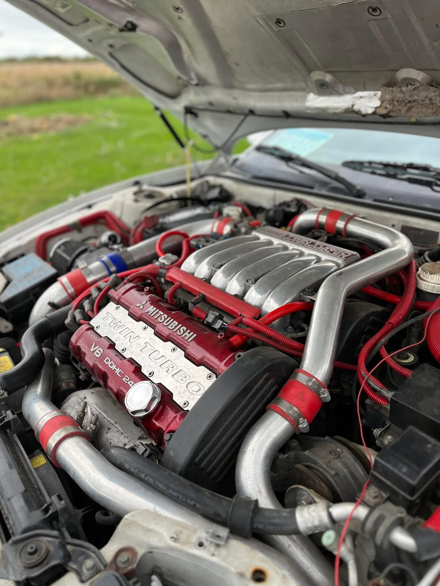 Powered by Mitsubishi’s 6G72, a twin-turbocharged 3.0-liter V6 delivers approximately 300 horsepower and 307 lb-ft of torque