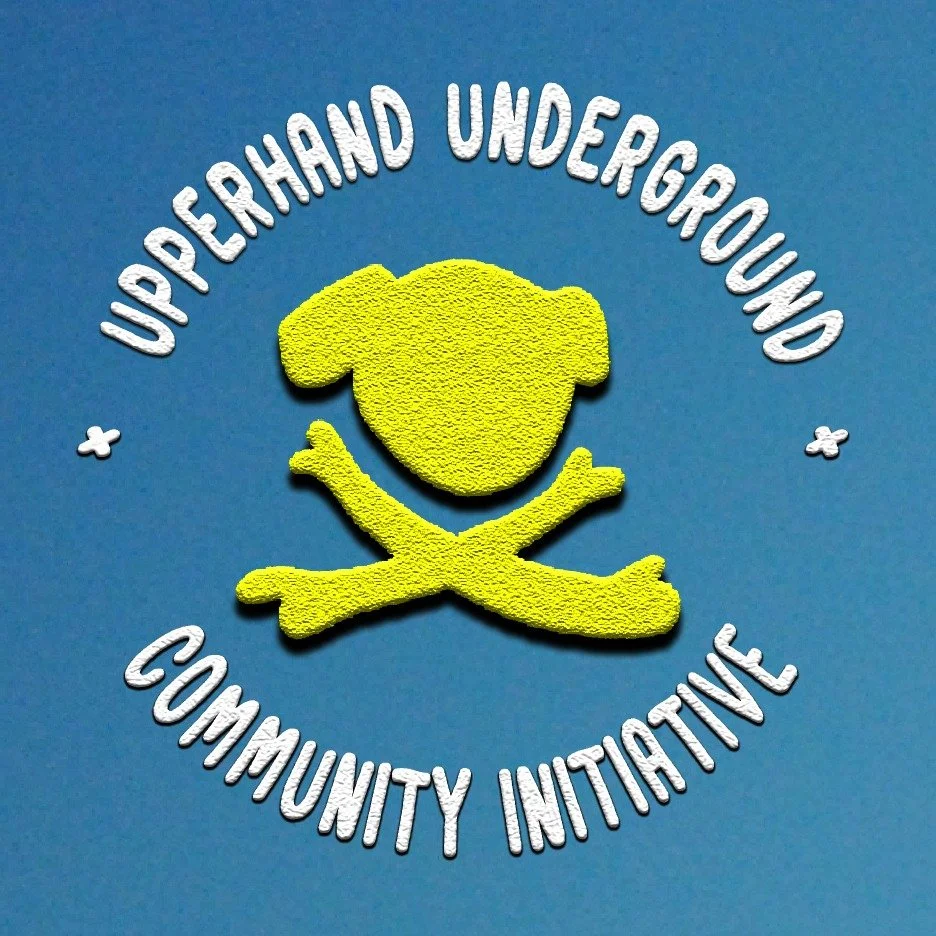 A graphic with a blue background featuring a yellow textured figure of a child's face and crossed arms, surrounded by the words 'Upperhand Underground' at the top and 'Community Initiative' at the bottom in white, curved text.
