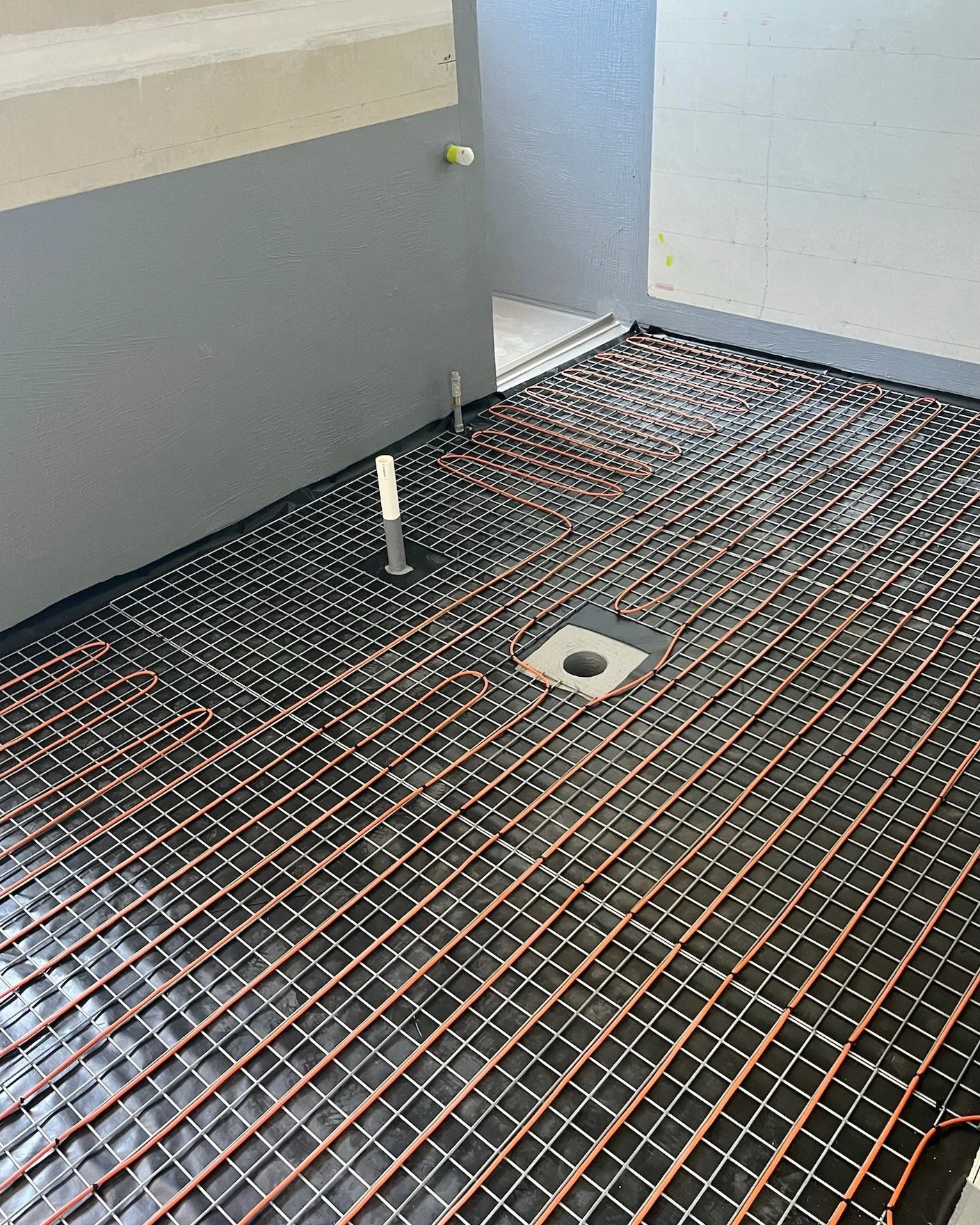 At our Talofa project, underfloor heating is being installed in every bathroom &mdash; delivering consistent, radiant warmth underfoot.

Beyond comfort, it enhances moisture control, supports energy efficiency, and elevates the everyday experience of