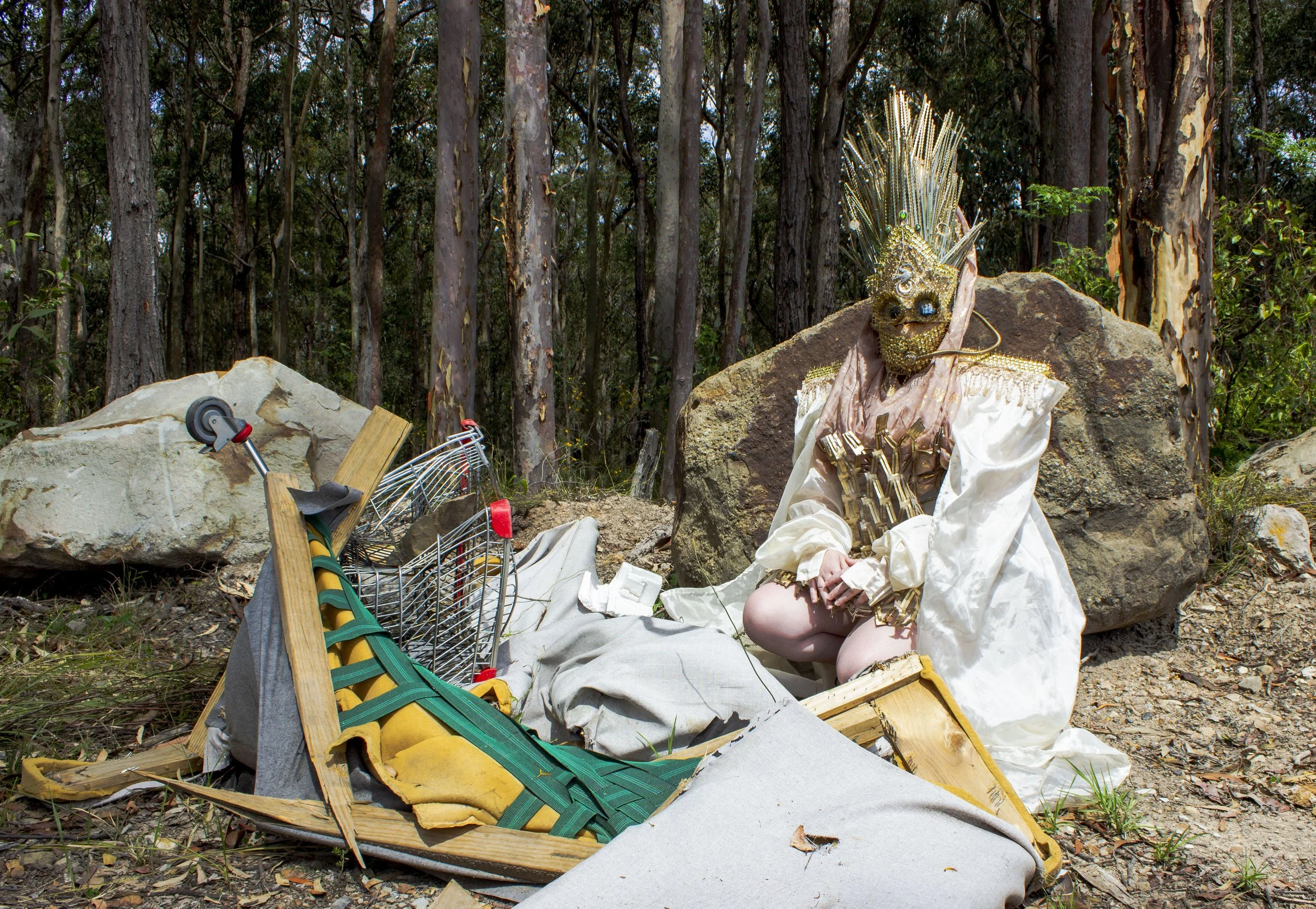 'Desert Queen Warrior' 2021.
Mixed media repurposed wearable 
sculpture. Featuring second hand fabrics, cardboard packaging, 
push pins, spaghetti, fashion accessories and zip ties.
Headpiece featured in Festival X, WattSpace Gallery UoN.
Model: Jana
