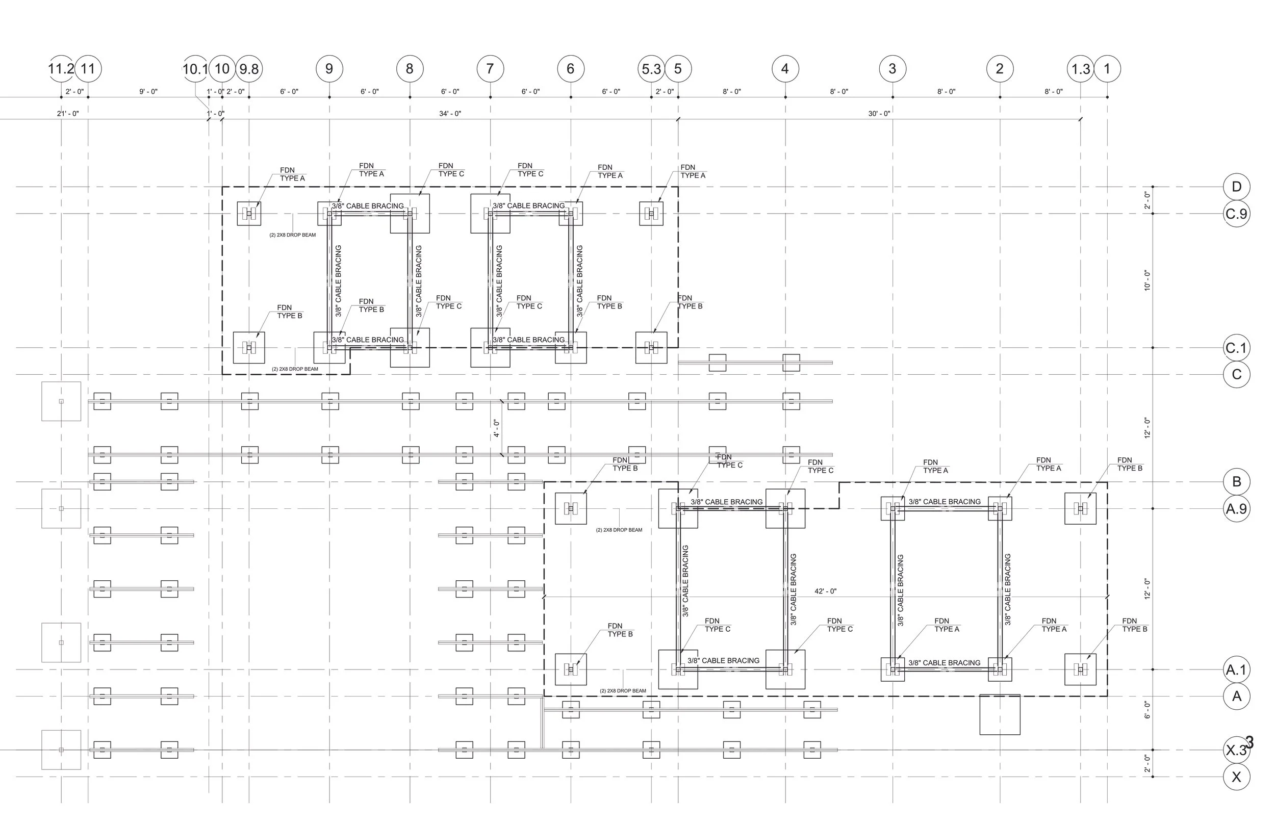 The foundation consists of 24 footings, a drop beam assembly, and a cross-bracing system made up of pressure-treated wood and steel cable.