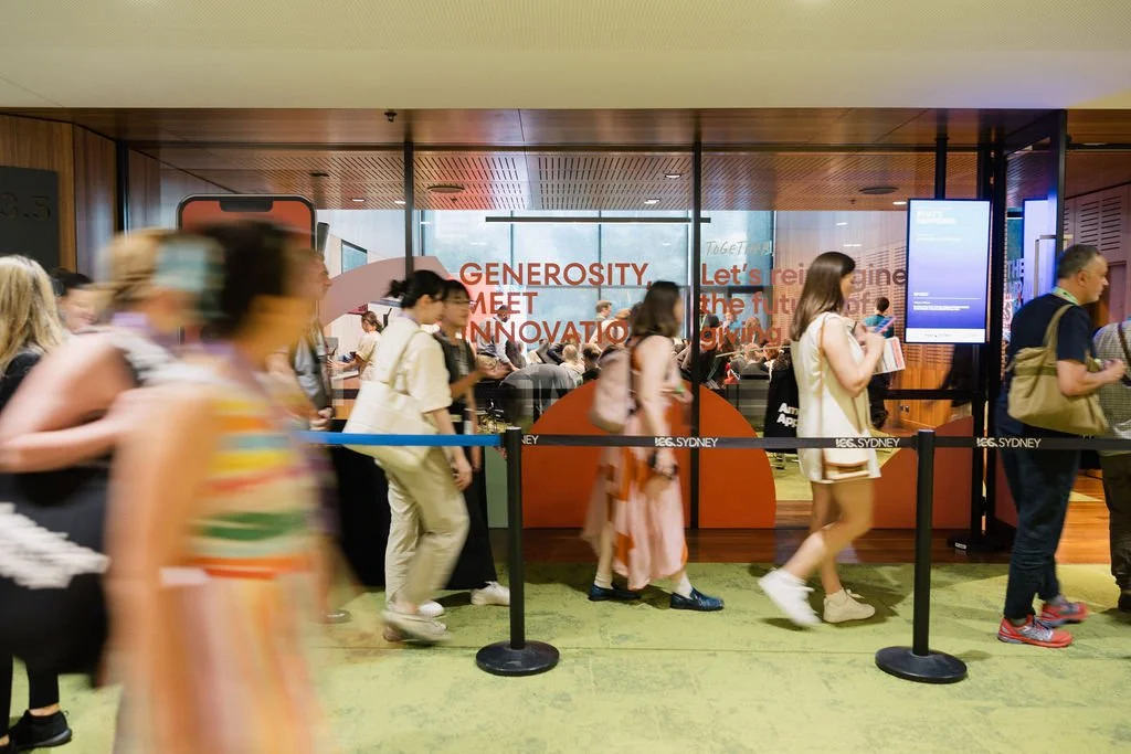 Line of people waiting for entry to the Impact Stage 2025.