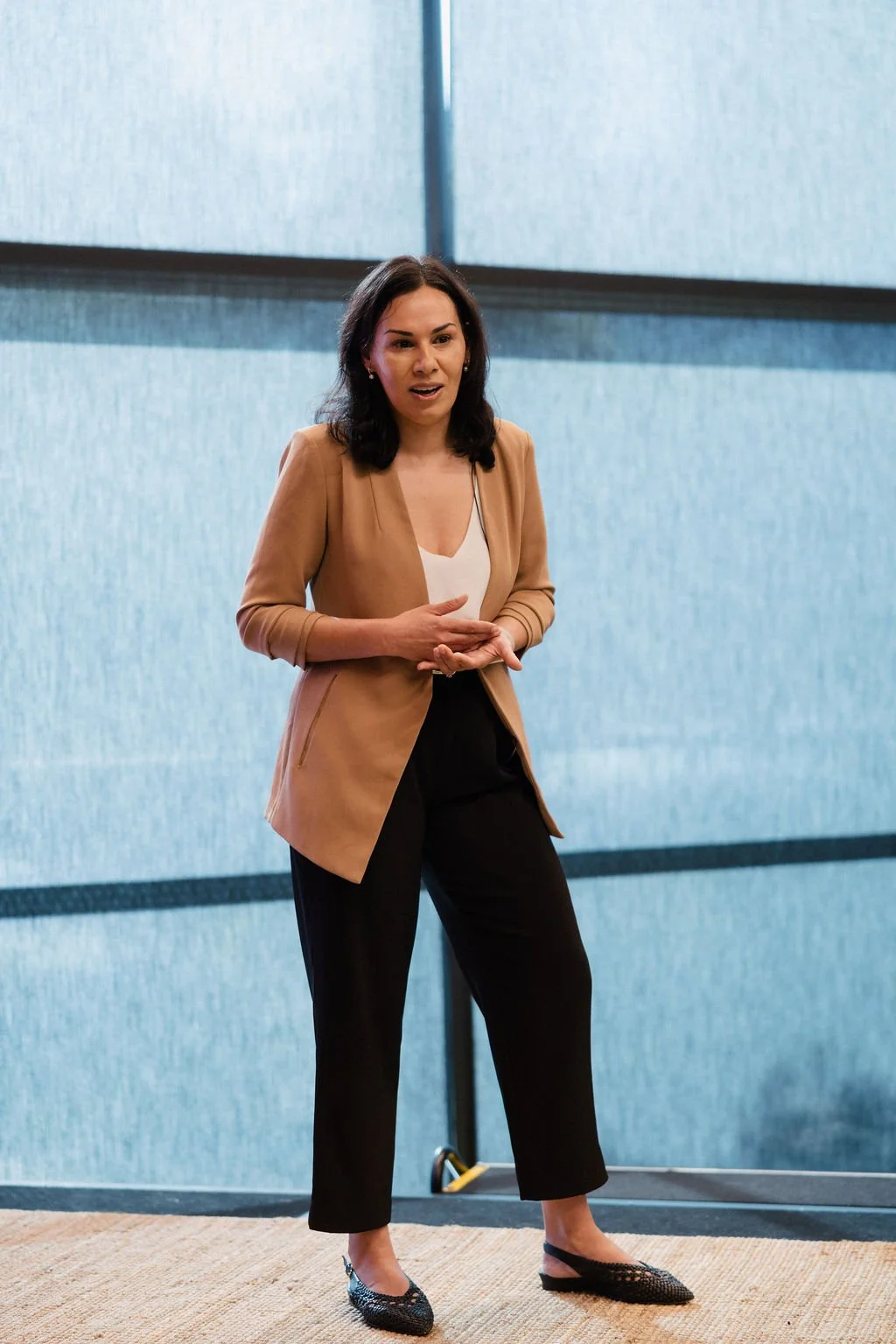 Anita Sood from Microsoft speaking at the Impact Stage in 2025