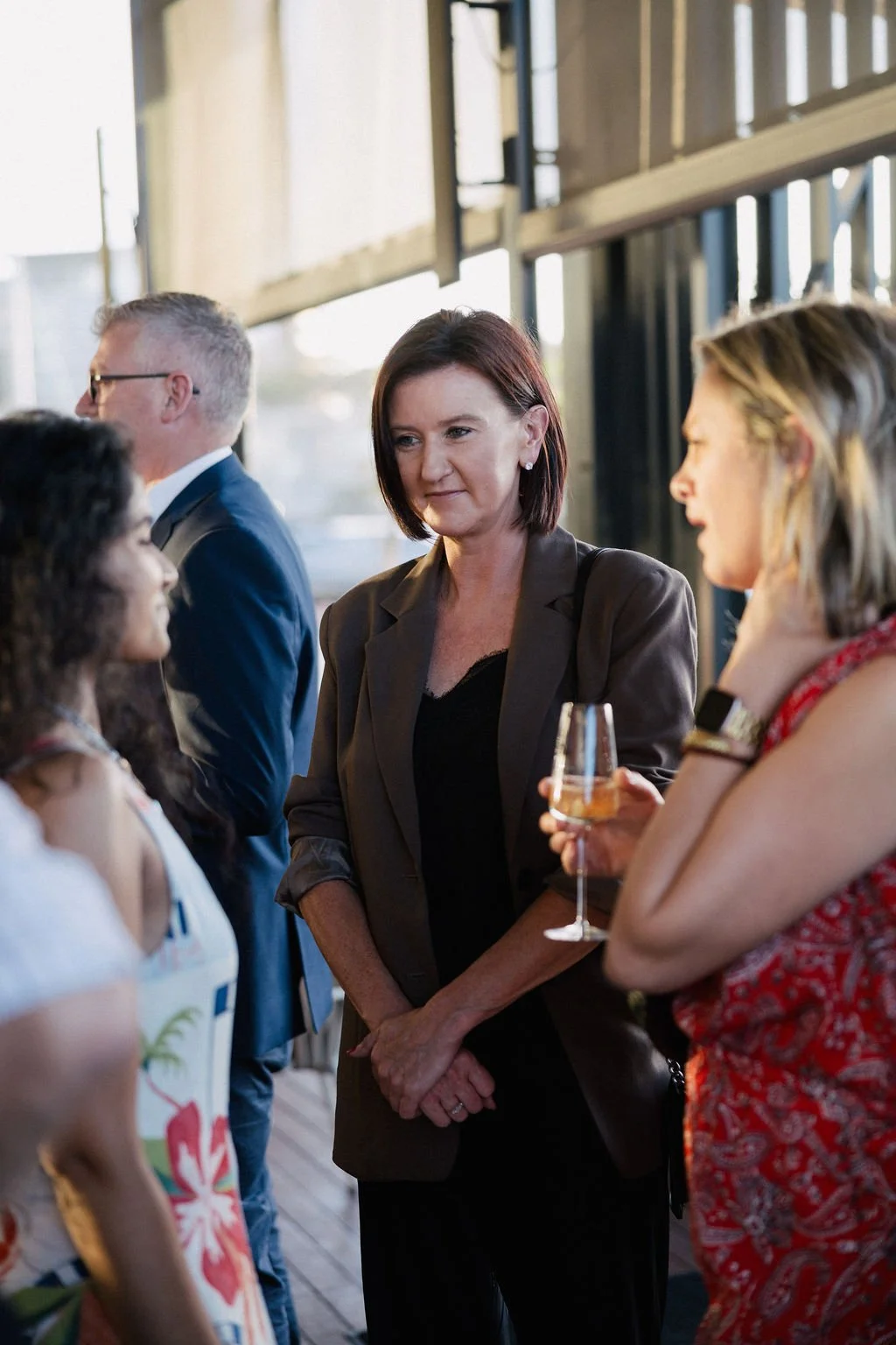 Socialising at the 2025 Impact Stage VIP dinner presented by Charitabl.