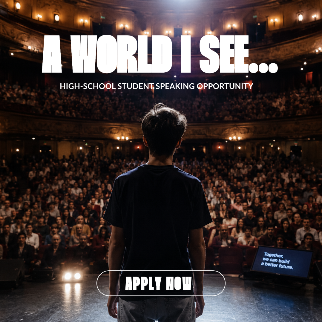 Child standing on state theatre stage at the Global Impact Summit