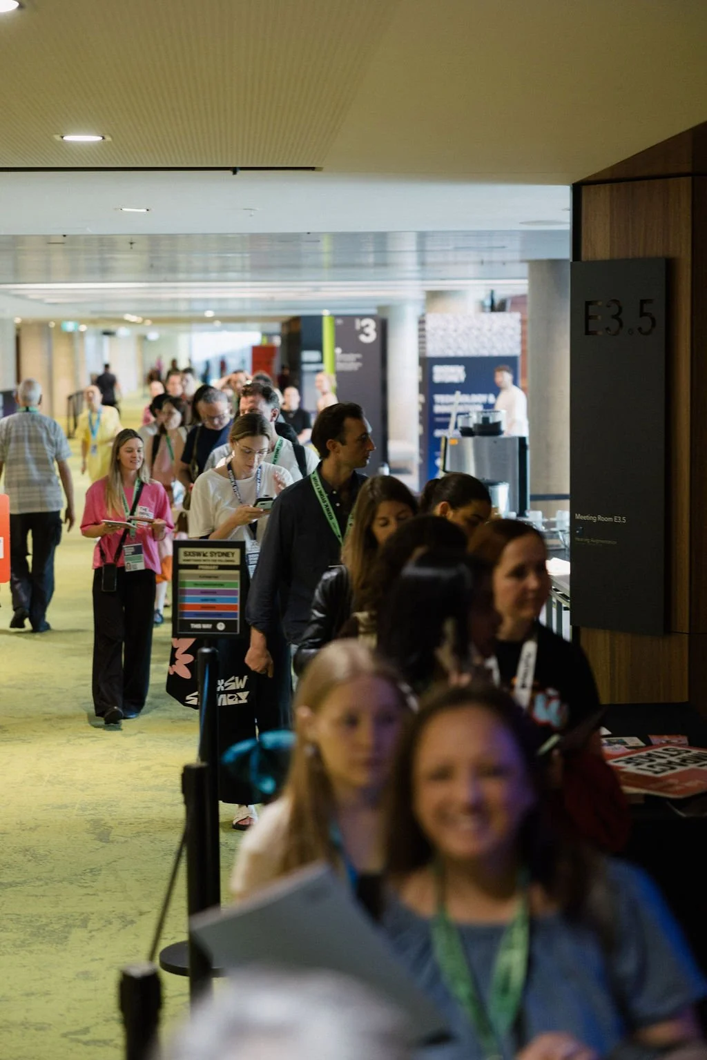 Line of people waiting for entry to the Impact Stage 2025.