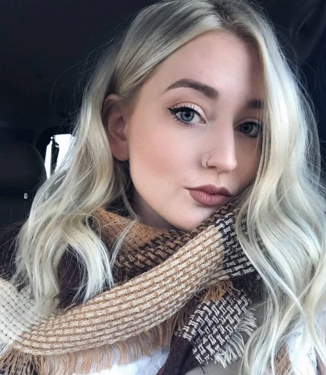 Blonde highlights and platinum hair color. High end salon in Saskatoon on Central Avenue.