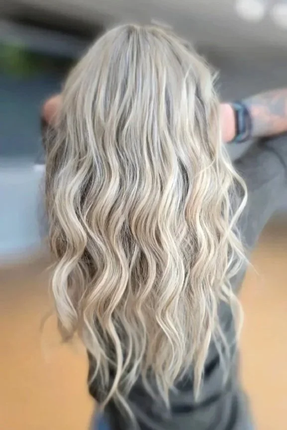 Blonde hair in Saskatoon high end salon on Central Avenue. Full highlights and cool blonde.