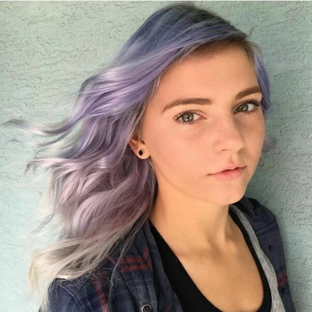 Vivids, rainbow hair in Saskatoon. Purple and silver hair at high-end salon on Central Avenue with beachy waves.