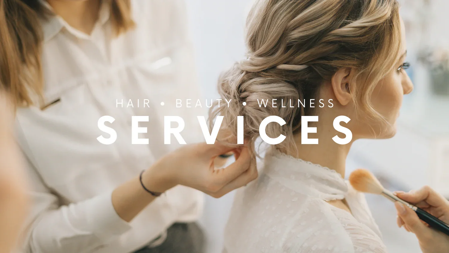 Woman getting her hair styled at a beauty salon, with the words 'Hair, Beauty, Wellness Services' overlayed.