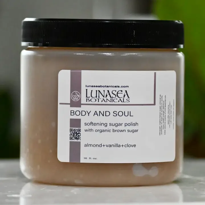 A jar of LunaSea Botanicals Body and Soul softening sugar polish with organic brown sugar, almond, vanilla, and clove. Central Hair District in Saskatoon, Lori Miller.