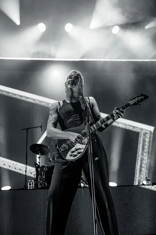 Caleb Harper, the lead vocalist and guitarist for the Australian indie-rock band Spacey Jane performing sat a music festival in McLaren Vale, South Australia