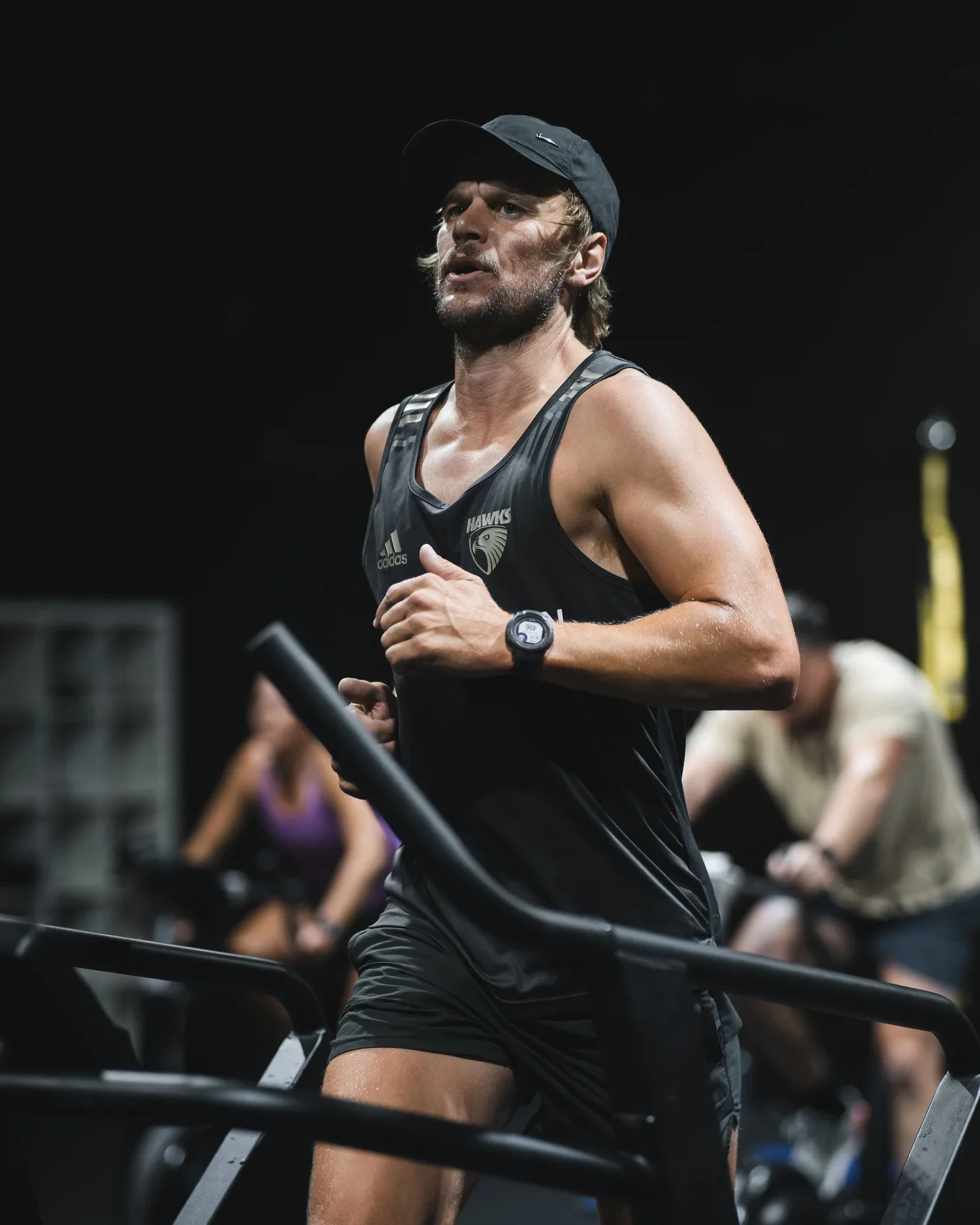 a man running on a treadmill 