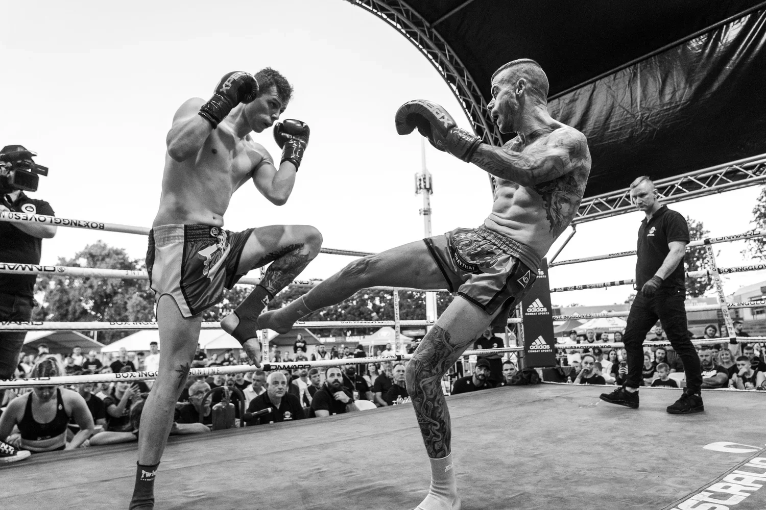 a Muay Thai fighter kicking his opponent during a Muay Thai fight