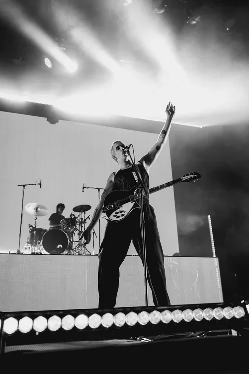 Caleb Harper, the lead vocalist and guitarist for the Australian indie-rock band Spacey Jane performing sat a music festival in McLaren Vale, South Australia