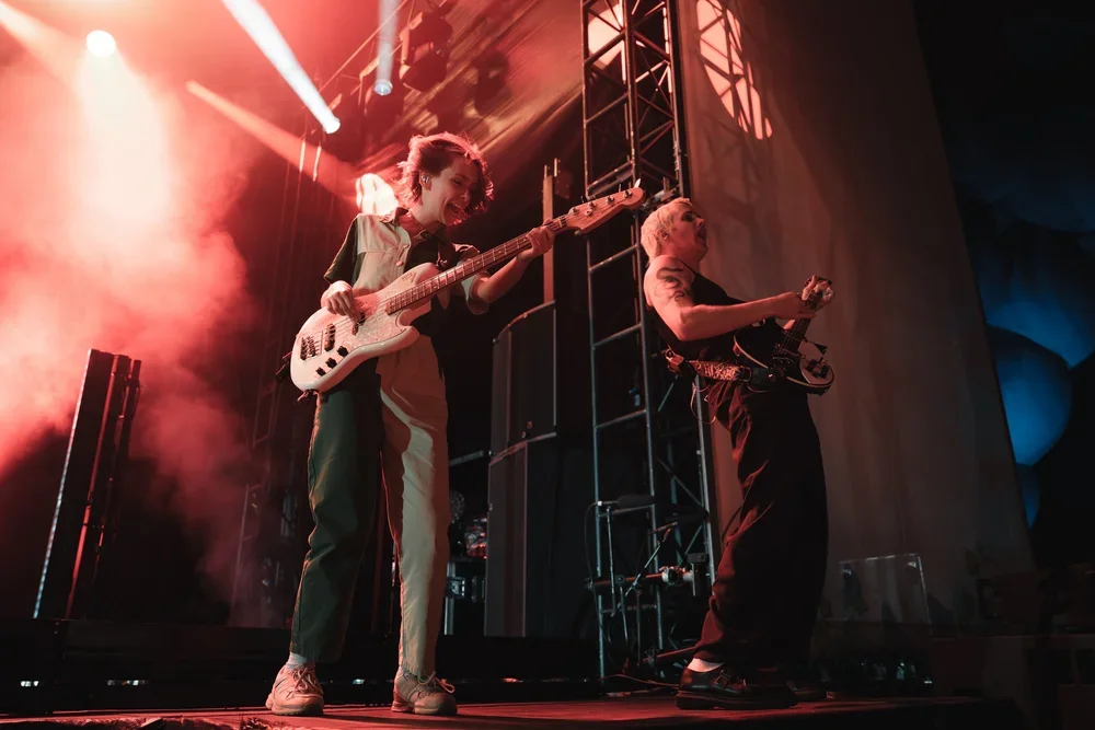 Caleb Harper, the lead vocalist and guitarist for the Australian indie-rock band Spacey Jane performing sat a music festival in McLaren Vale, South Australia