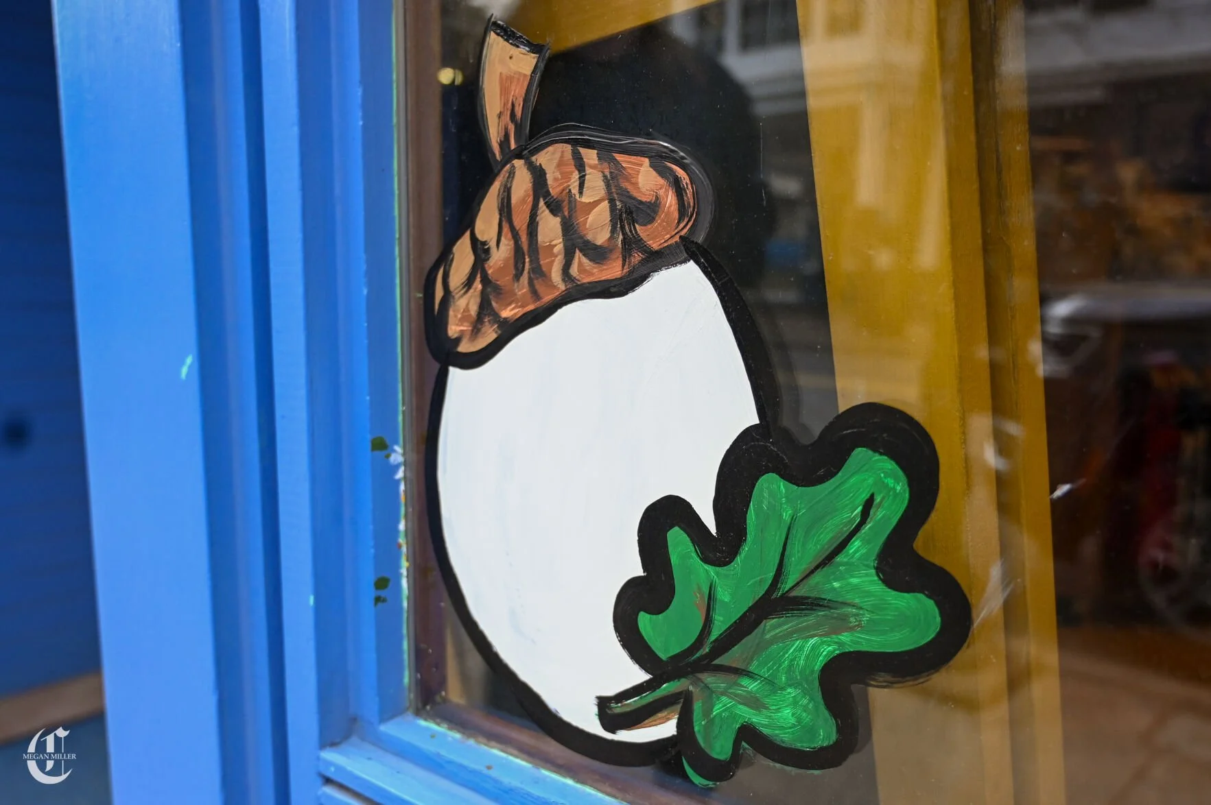 Easter egg paintings fill business-front windows, hearts of downtown State College