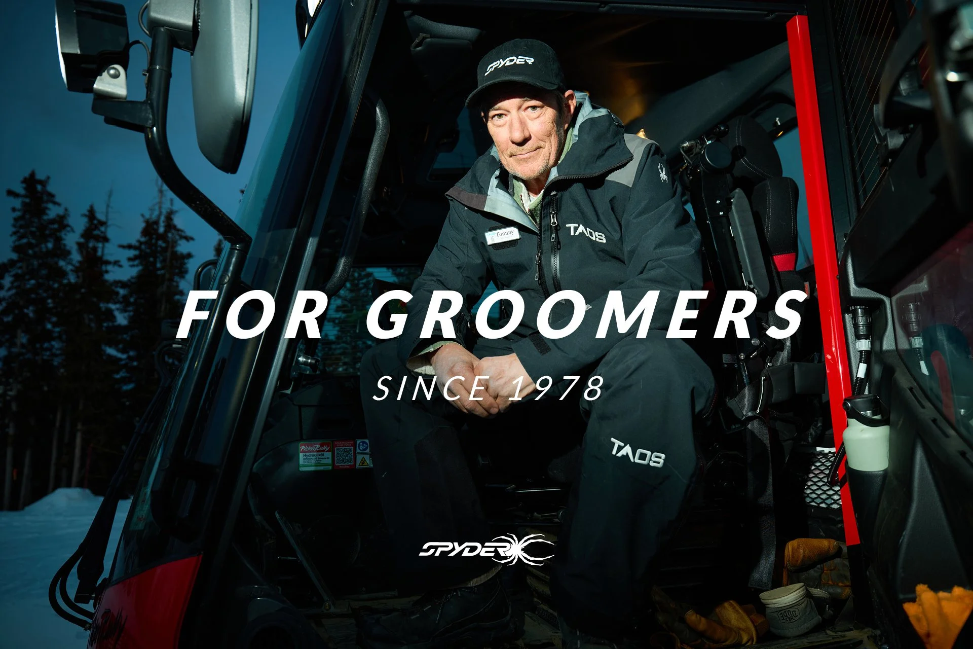 A man in winter gear sitting inside a vehicle, with trees in the background, promoting a grooming business since 1978.