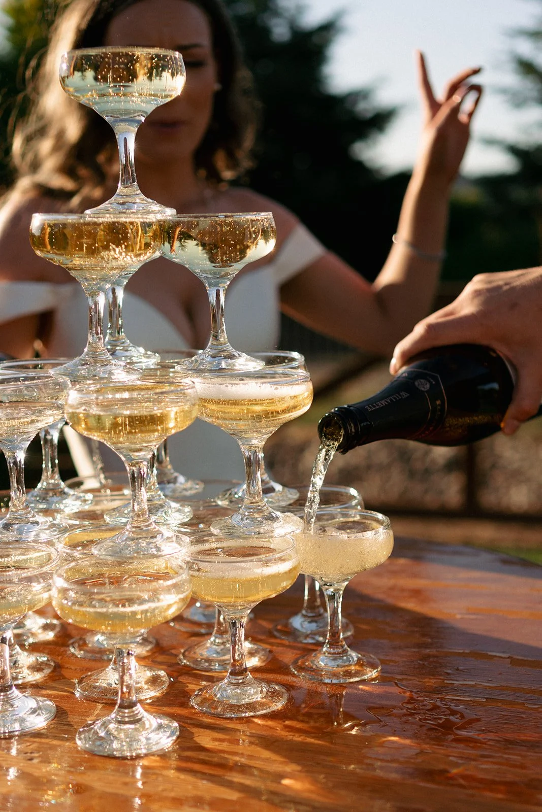 Laurie’s customers, Evan and Kade, running down a mountain after getting married. 