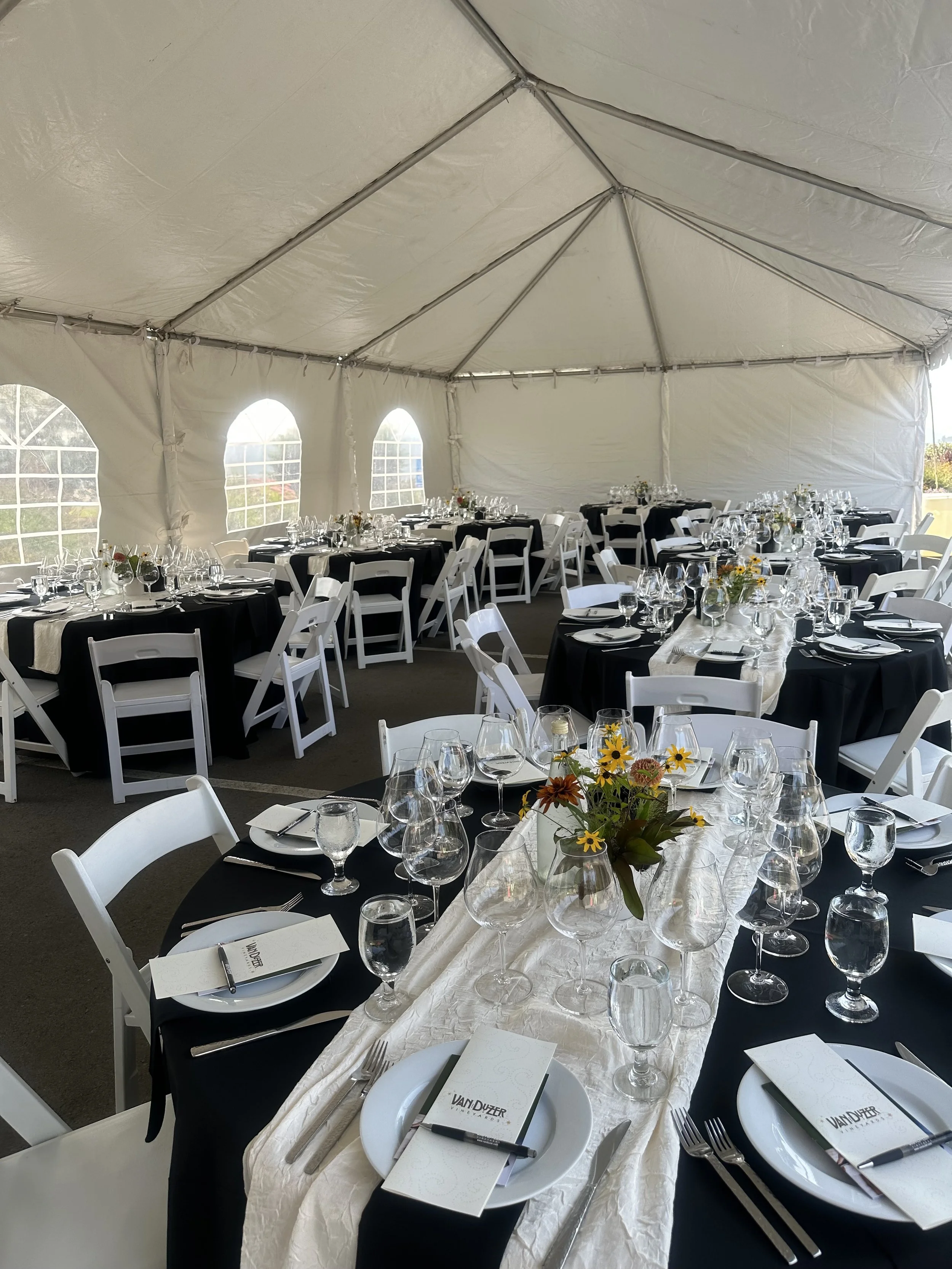Laurie’s customers, Larissa and Emmett, just married walking off the aisle together.