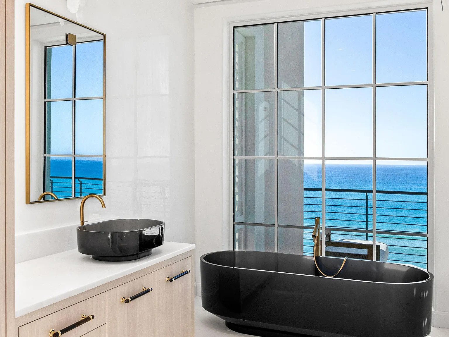 033-master-bath-black-tub-ocean-view-alt.jpg