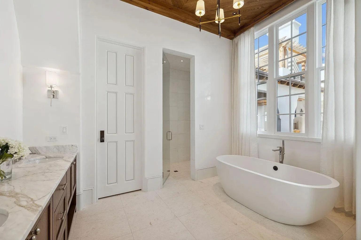 029-master-bath-soaking-tub-wood-ceiling-wide.jpg