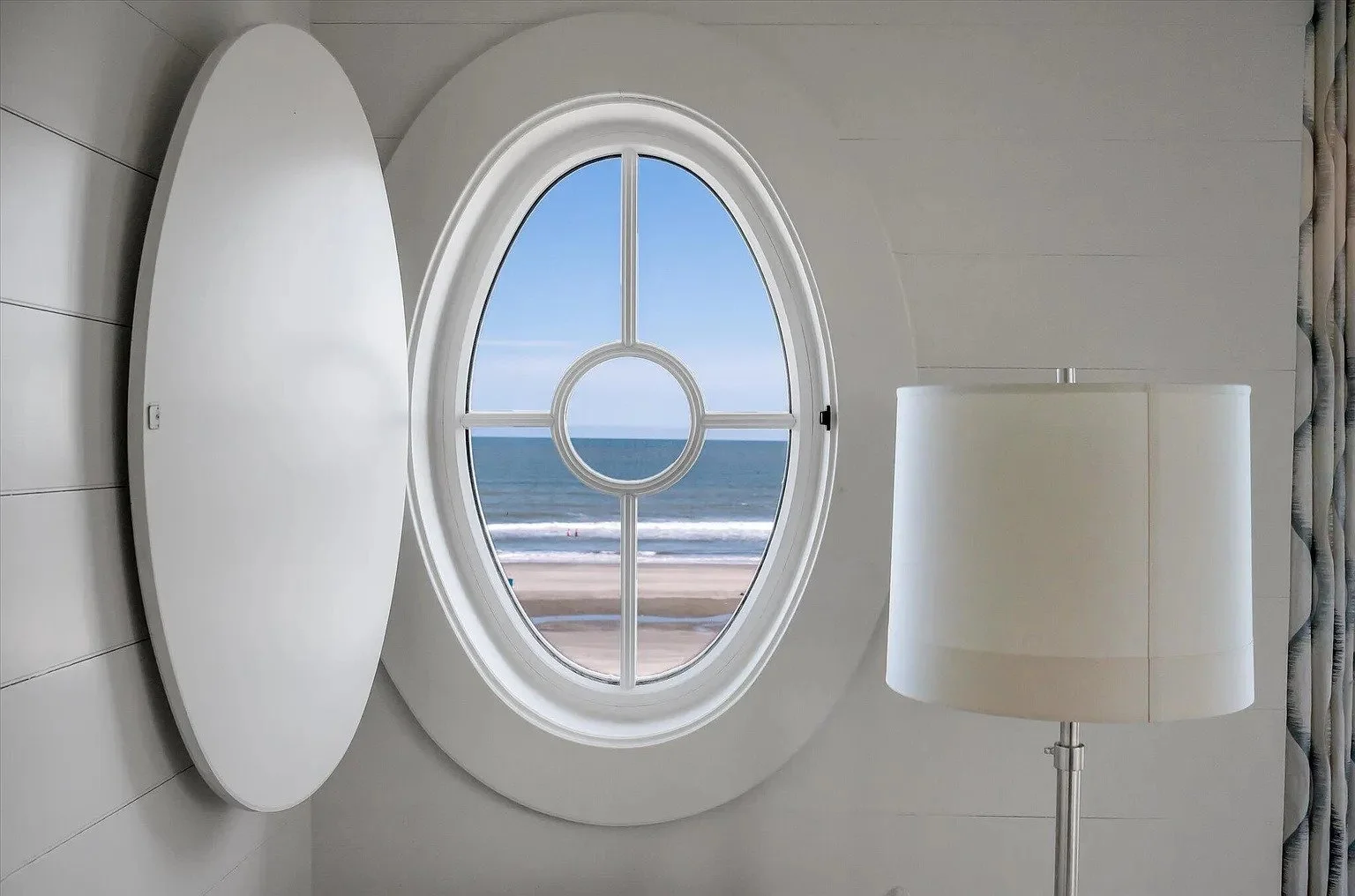 074-porthole-window-ocean-detail.jpg
